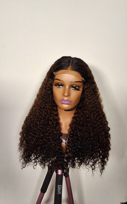22 inches Sdd Burmese curls.  3 tone colour. 5by5 glueless closure