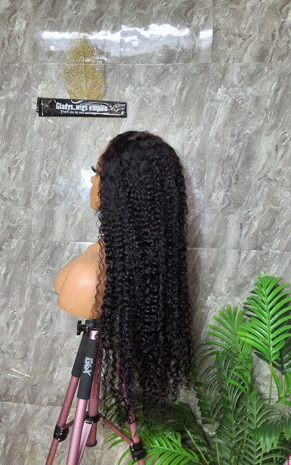 34 inches jerry curls. Paired with 5x5 closure. Natural colour
