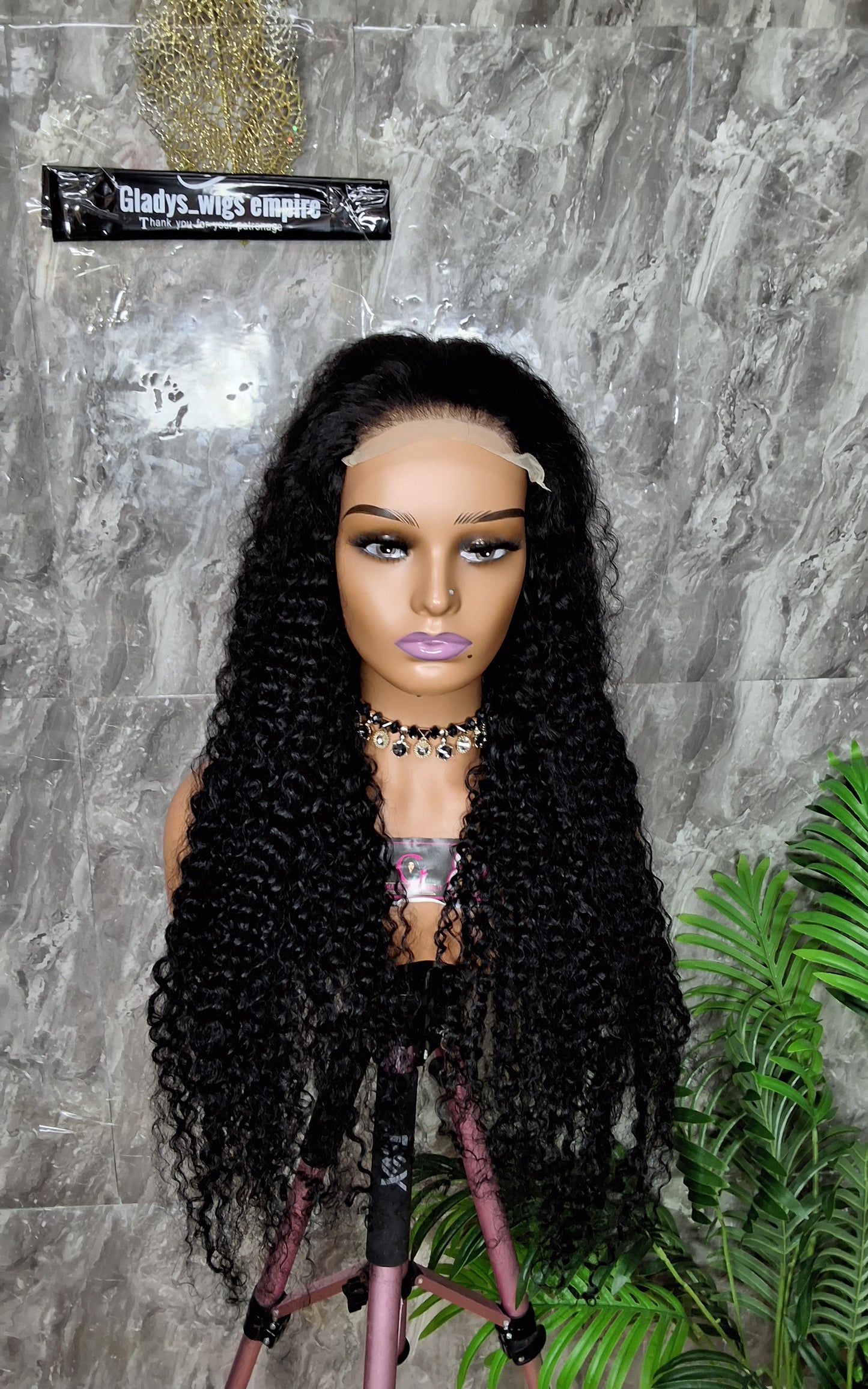 34 inches jerry curls. Paired with 5x5 closure. Natural colour