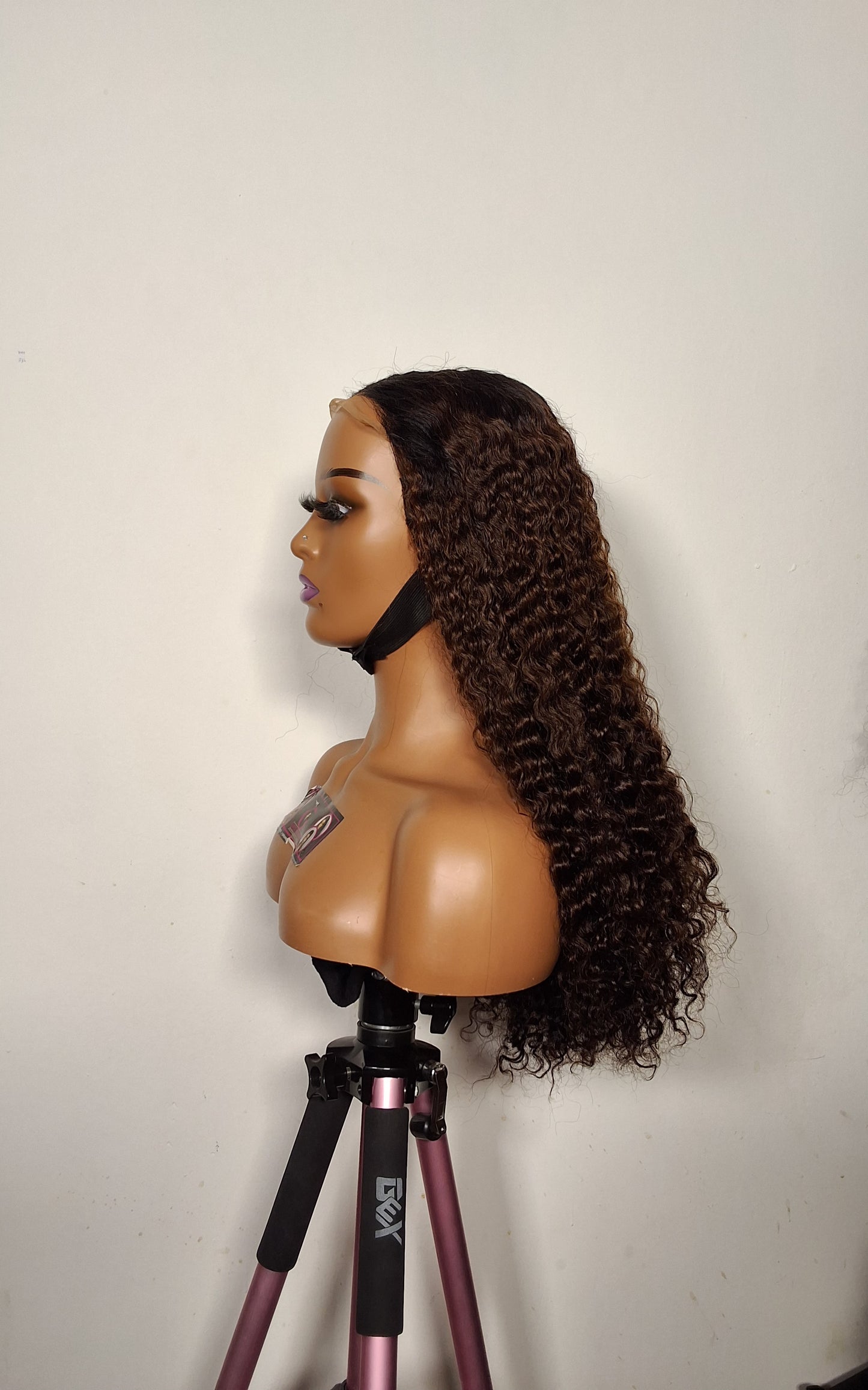 22 inches Sdd Burmese curls.  3 tone colour. 5by5 glueless closure