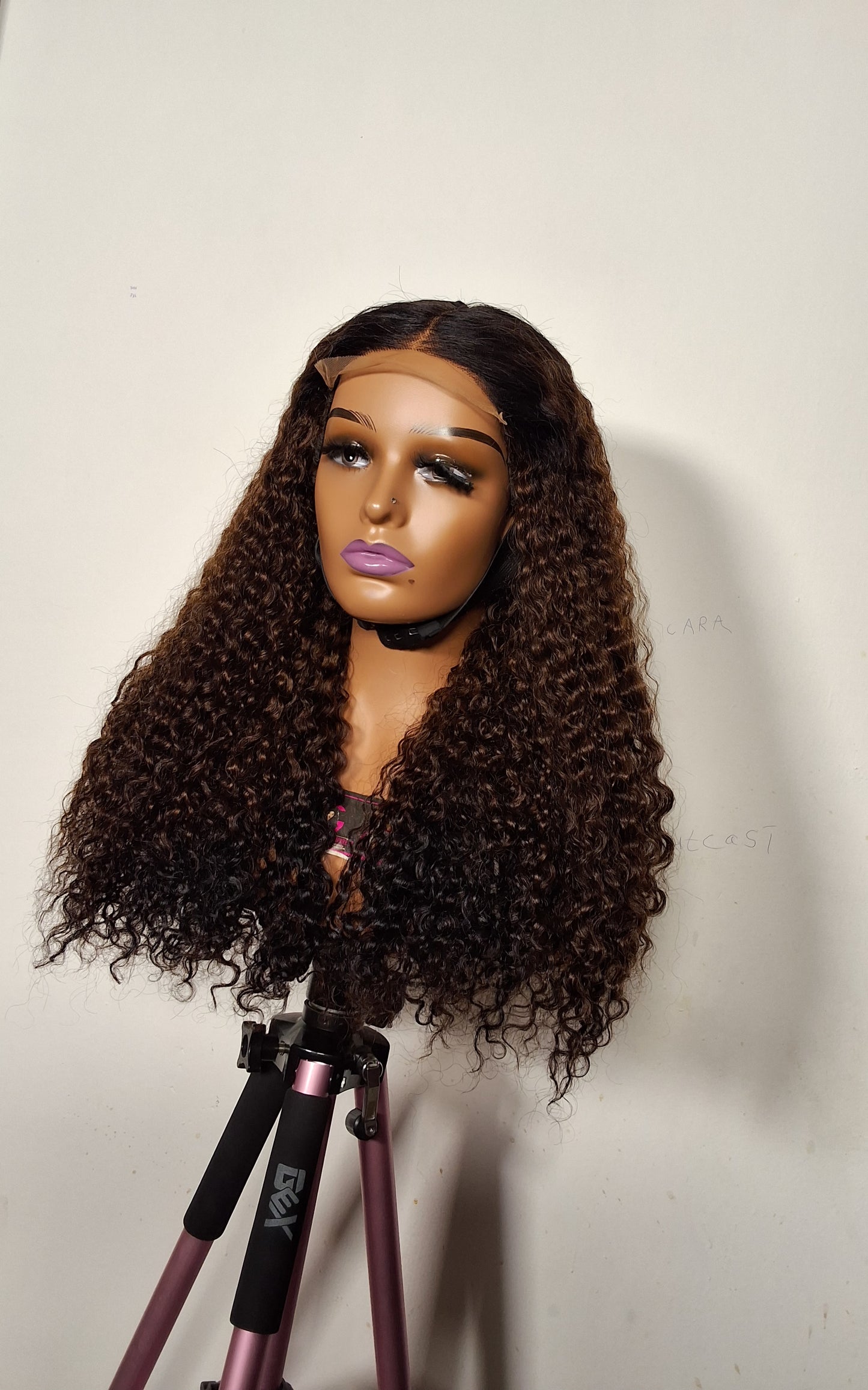 22 inches Sdd Burmese curls.  3 tone colour. 5by5 glueless closure