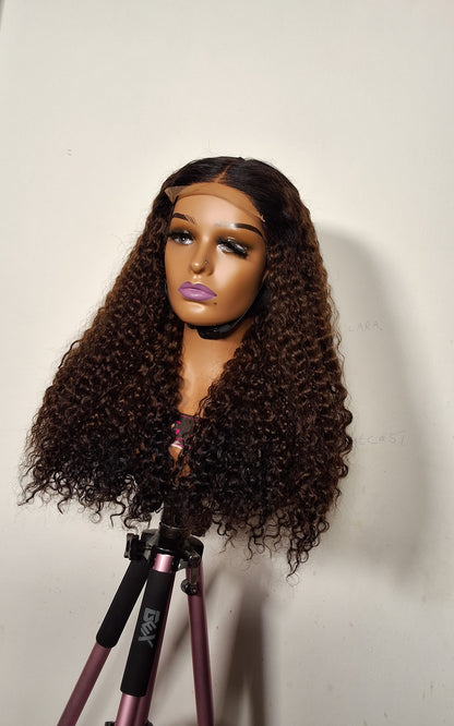 22 inches Sdd Burmese curls.  3 tone colour. 5by5 glueless closure
