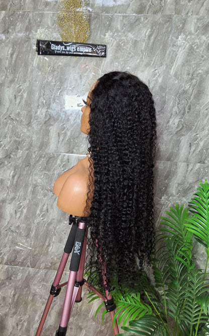 34 inches jerry curls. Paired with 5x5 closure. Natural colour