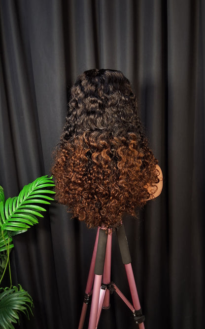 5x5 closure  sassy curls. Natural/brown tip. 20 inches