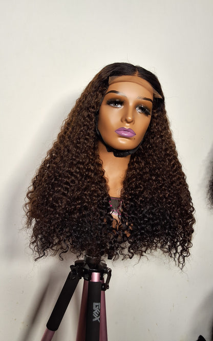 22 inches Sdd Burmese curls.  3 tone colour. 5by5 glueless closure
